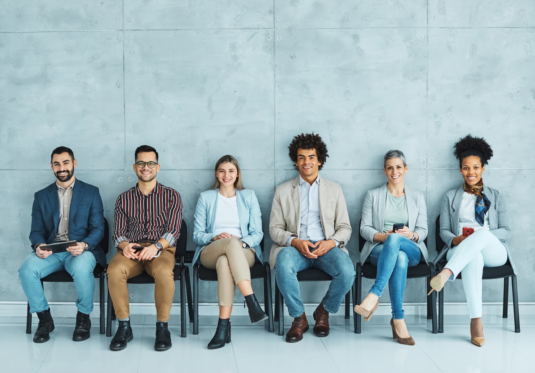 Candidatos à espera de uma entrevista de emprego